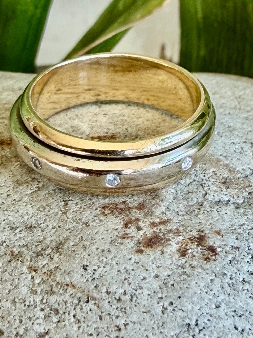 14 karat gold spinner ring with diamonds